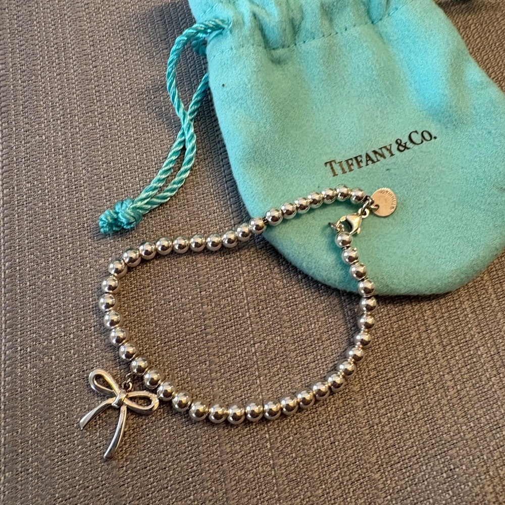 Tiffany & Co. Silver Bracelet with Bow Charm